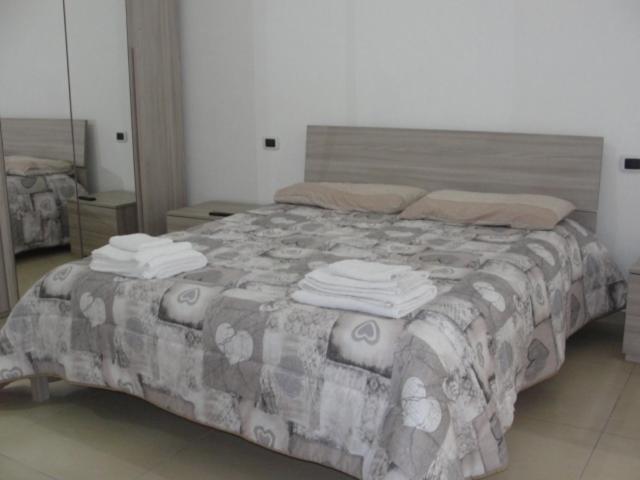 מיטה או מיטות בחדר ב-la casa di Marco