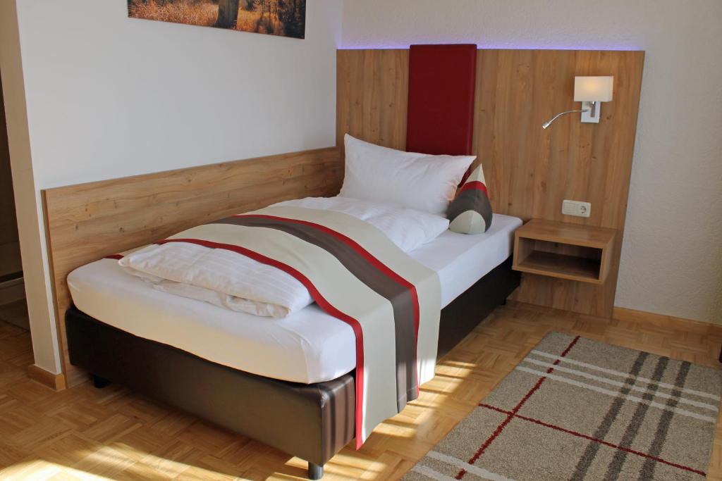 Postel nebo postele na pokoji v ubytování Genusshotel "Zum Wendl"
