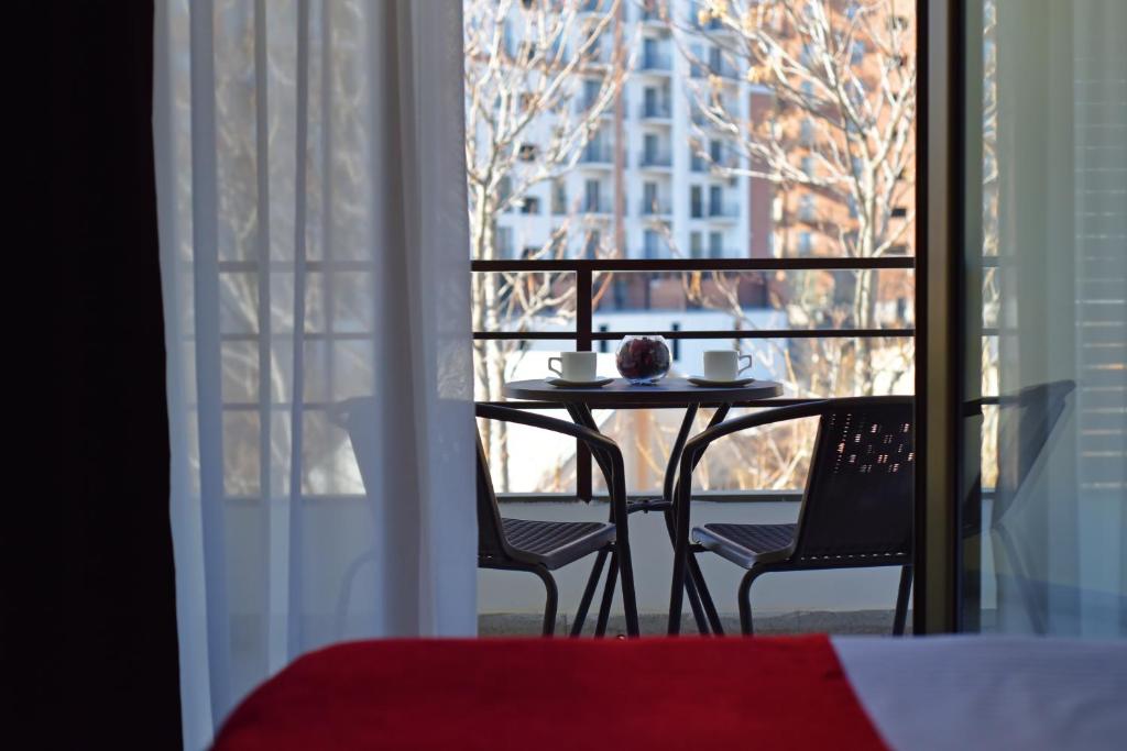 Balkón nebo terasa v ubytování East Gate Boutique Hotel