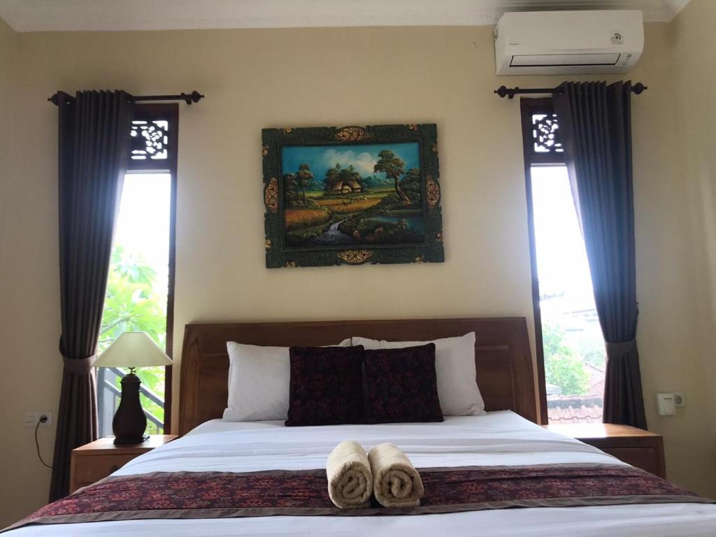 Postel nebo postele na pokoji v ubytování Shindu Home Stay Room 8