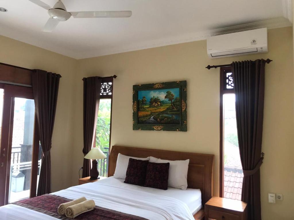 Postel nebo postele na pokoji v ubytování Shindu Home Stay Room 8