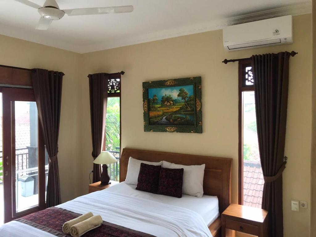 Postel nebo postele na pokoji v ubytování Shindu Home Stay Room 8