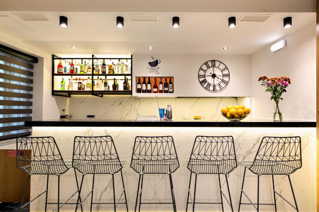 Nápoje v ubytování Hotel Ideon