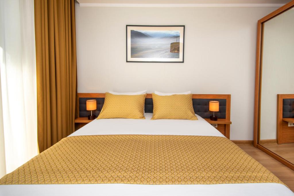Letto o letti in una camera di Orbi Palace Hotel Official