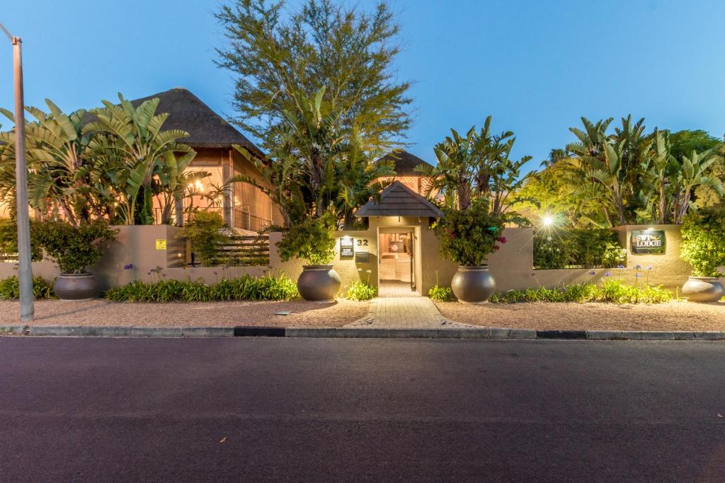 a house on the side of a street at SW1 Lodge in Somerset West