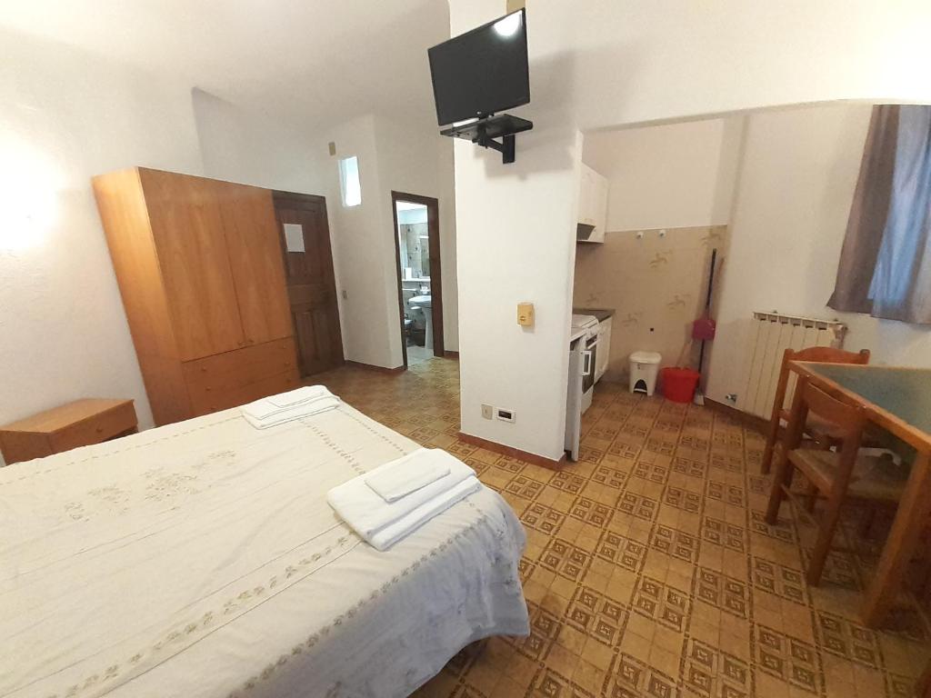 Postel nebo postele na pokoji v ubytování Paco Residence Benessere & Relax