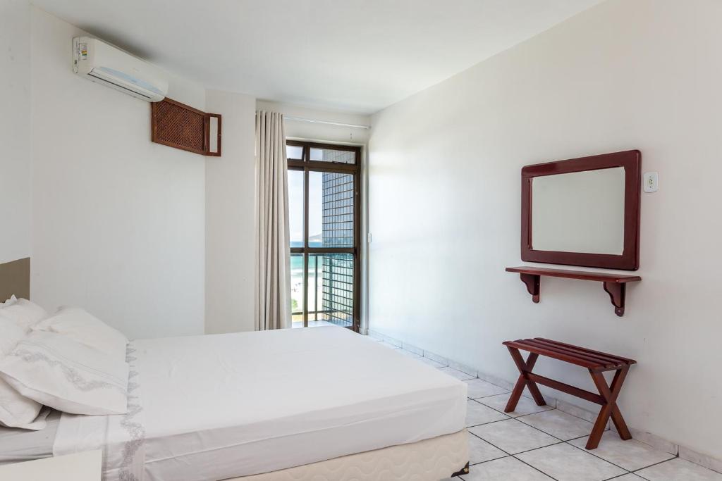 Postel nebo postele na pokoji v ubytování Apart Hotel Porto Príncipe