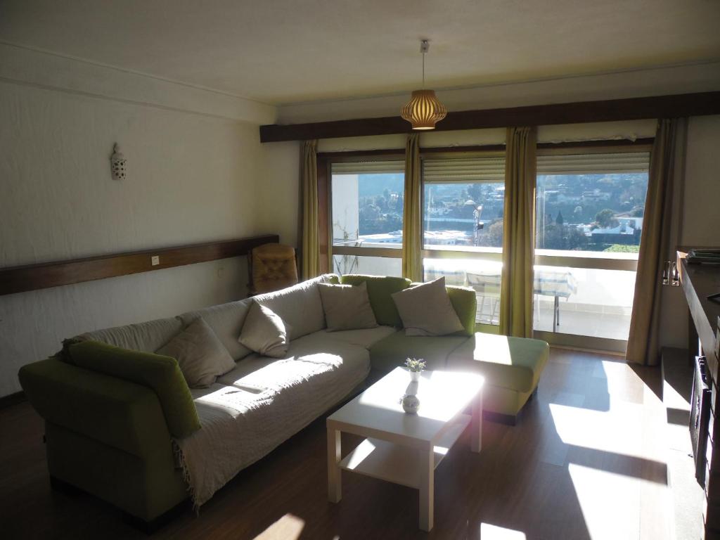 a living room with a couch and a table at T3 em Sever do Vouga in Sever do Vouga