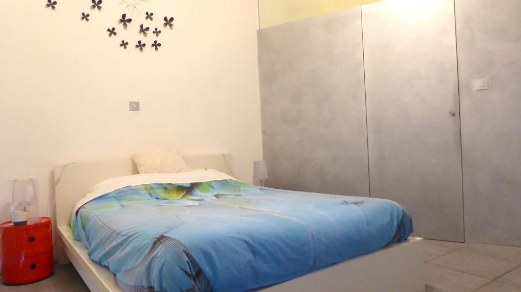 Postel nebo postele na pokoji v ubytování PLANT BASED b&b central Bruges