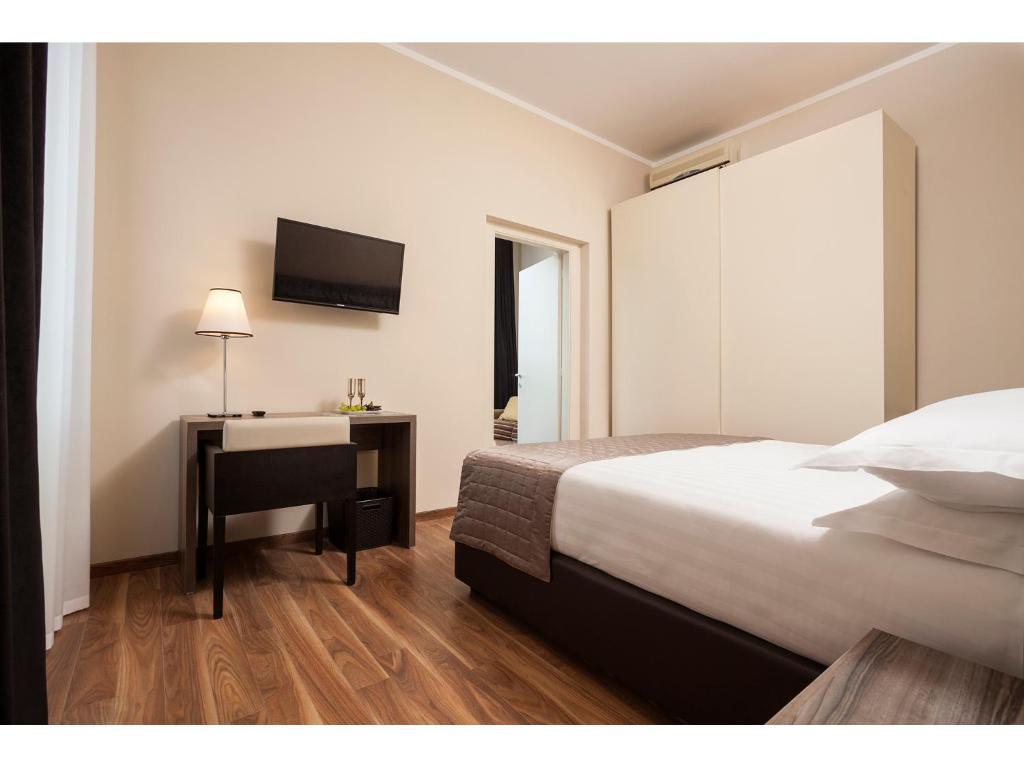 Un ou plusieurs lits dans un hébergement de l'établissement Window On Rome