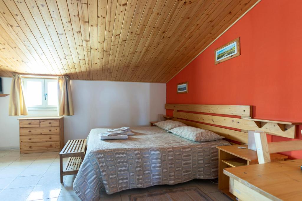 Postel nebo postele na pokoji v ubytování Giogaia