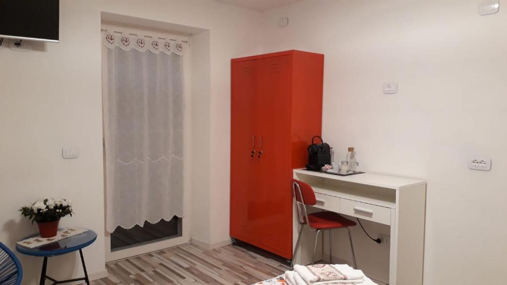 TV a/nebo společenská místnost v ubytování B&B Cuore Trentino