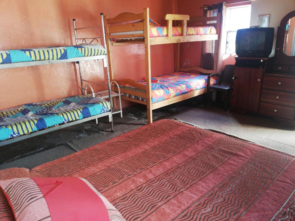 Postel nebo postele na pokoji v ubytování Montano Camping & Hostel