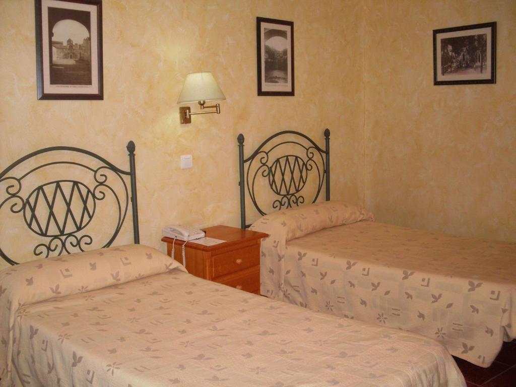 Posteľ alebo postele v izbe v ubytovaní Hotel Rural Ocell Francolí