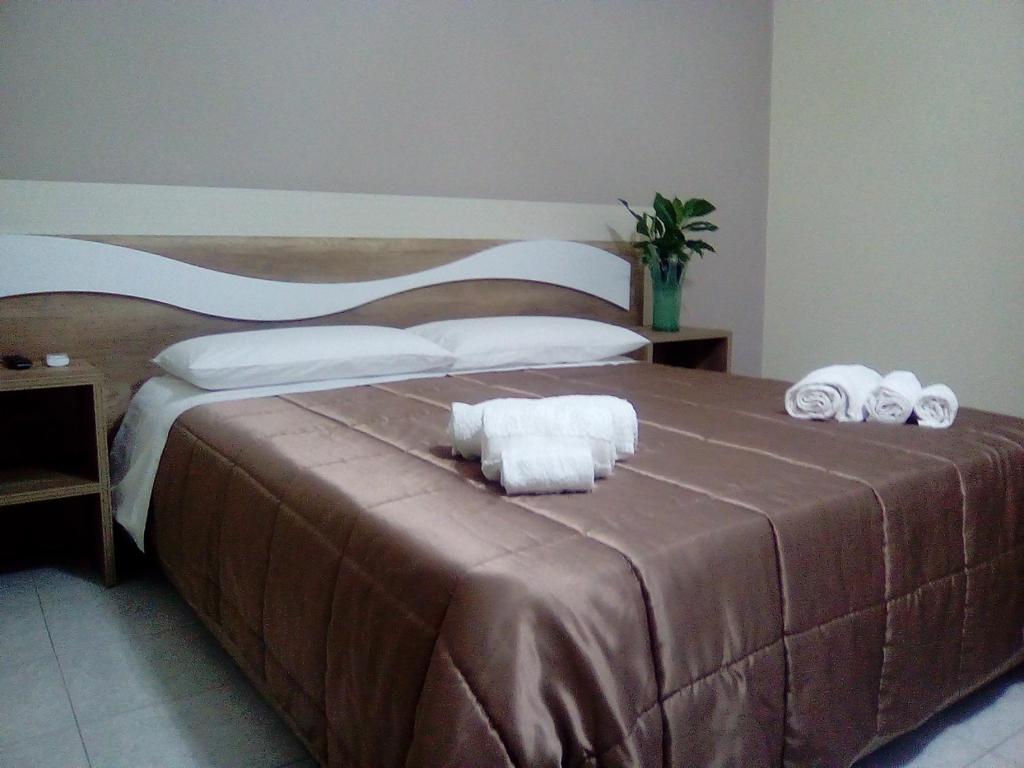 Postel nebo postele na pokoji v ubytování B&B AEREOSTATION