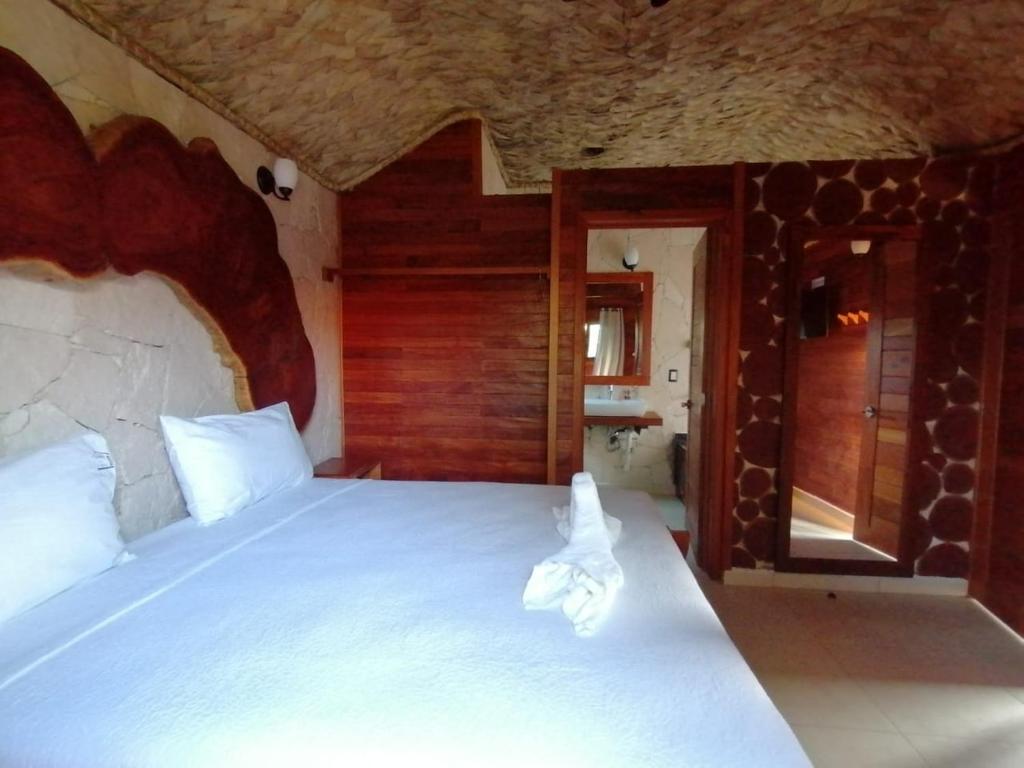 Postel nebo postele na pokoji v ubytování Cabañas la finca 2
