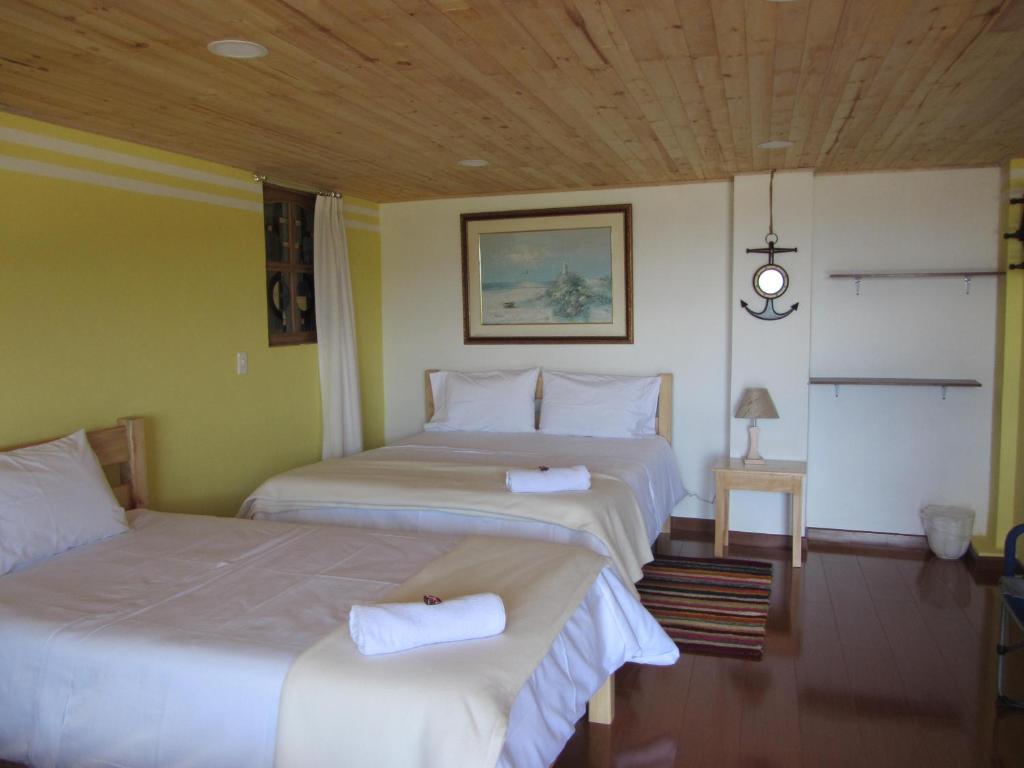 Postel nebo postele na pokoji v ubytování Ecohotel, Finca Colinas y Senderos
