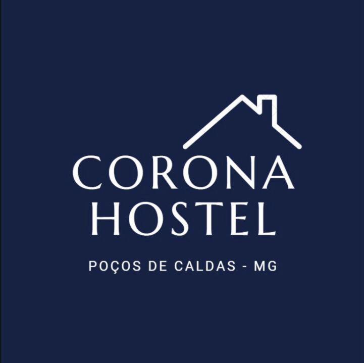 a logo for a house with a roof at Corona Hostel in Poços de Caldas