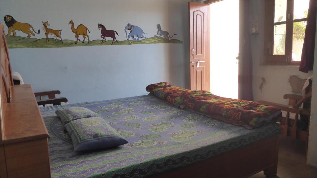 Letto o letti in una camera di Haveli Elephant Stable