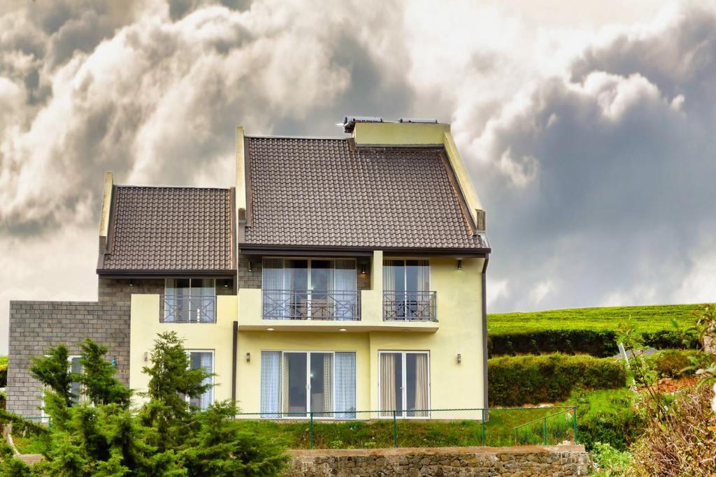 a house on the side of a hill at Wintry Hills By Lemas in Nuwara Eliya