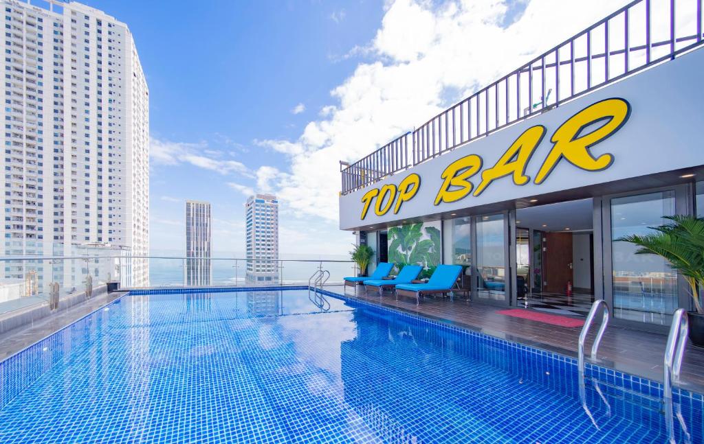 a swimming pool on the roof of a building at Pandora Boutique Hotel - Managed by ATH in Da Nang
