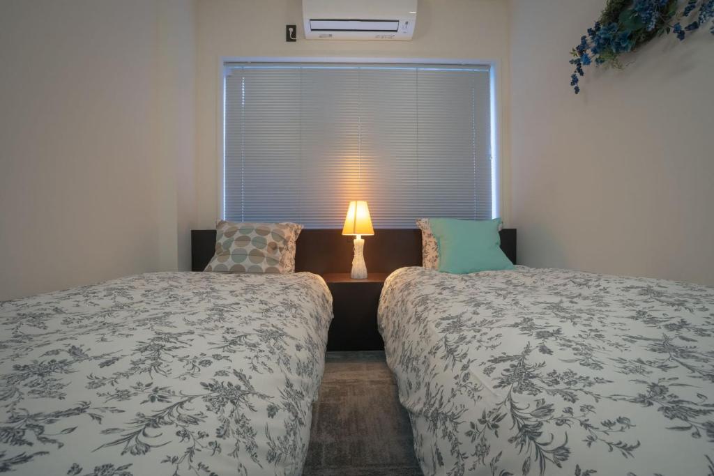 Postel nebo postele na pokoji v ubytování Hotel Trim