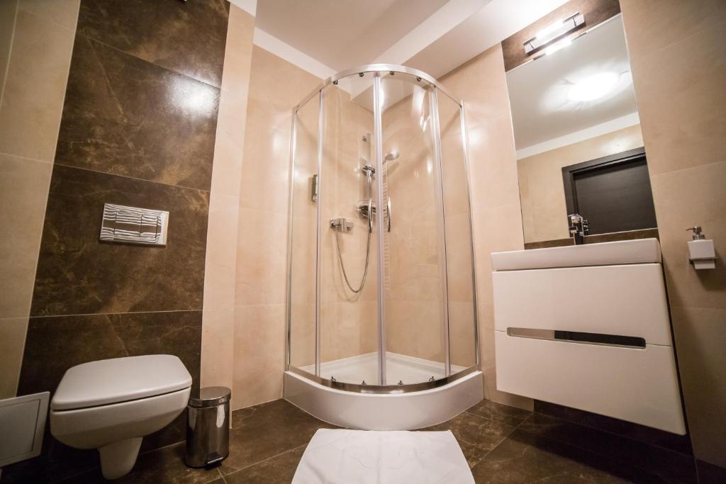 Koupelna v ubytování Hotel Avangarda