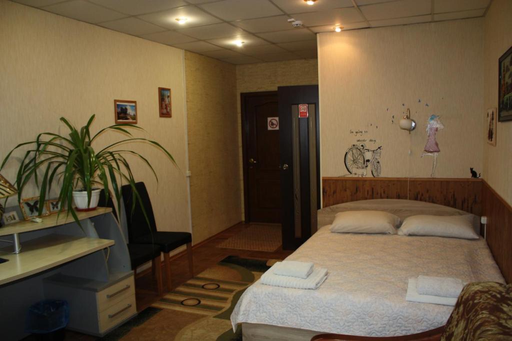 En eller flere senge i et værelse på motel Pid Strihoyu