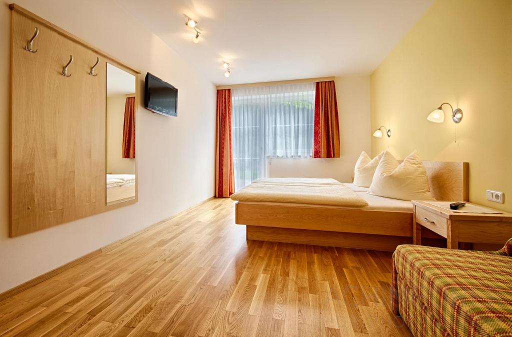 Łóżko lub łóżka w pokoju w obiekcie Appartementhaus Berger