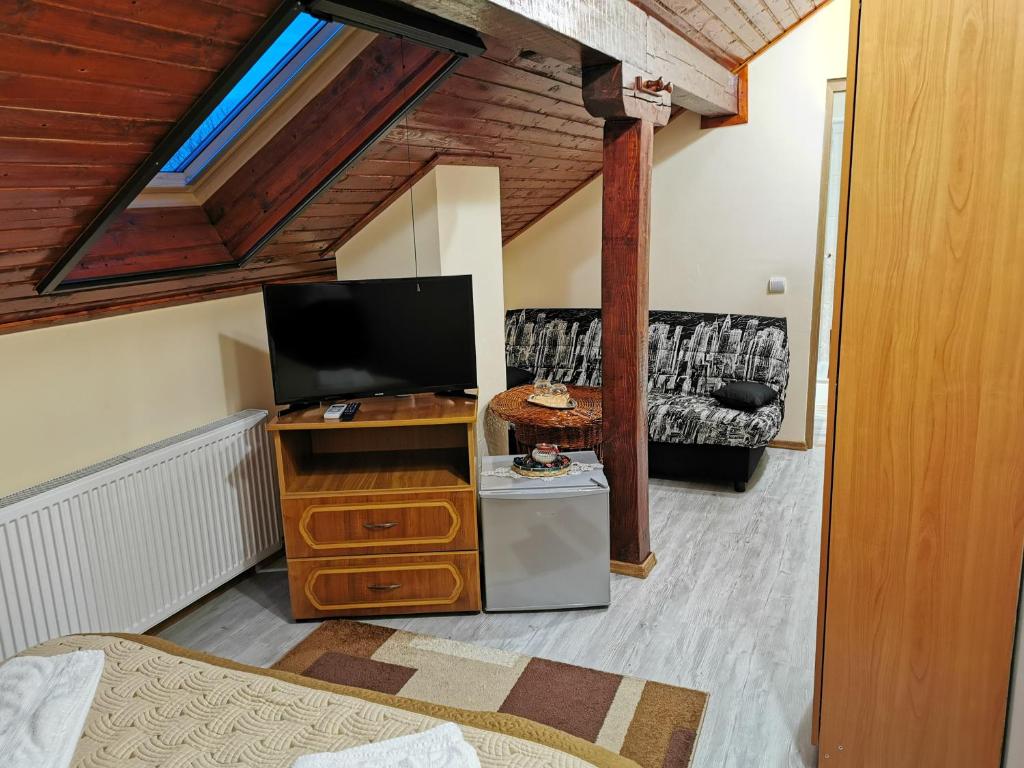 TV a/nebo společenská místnost v ubytování Casa Suzy & Roxy