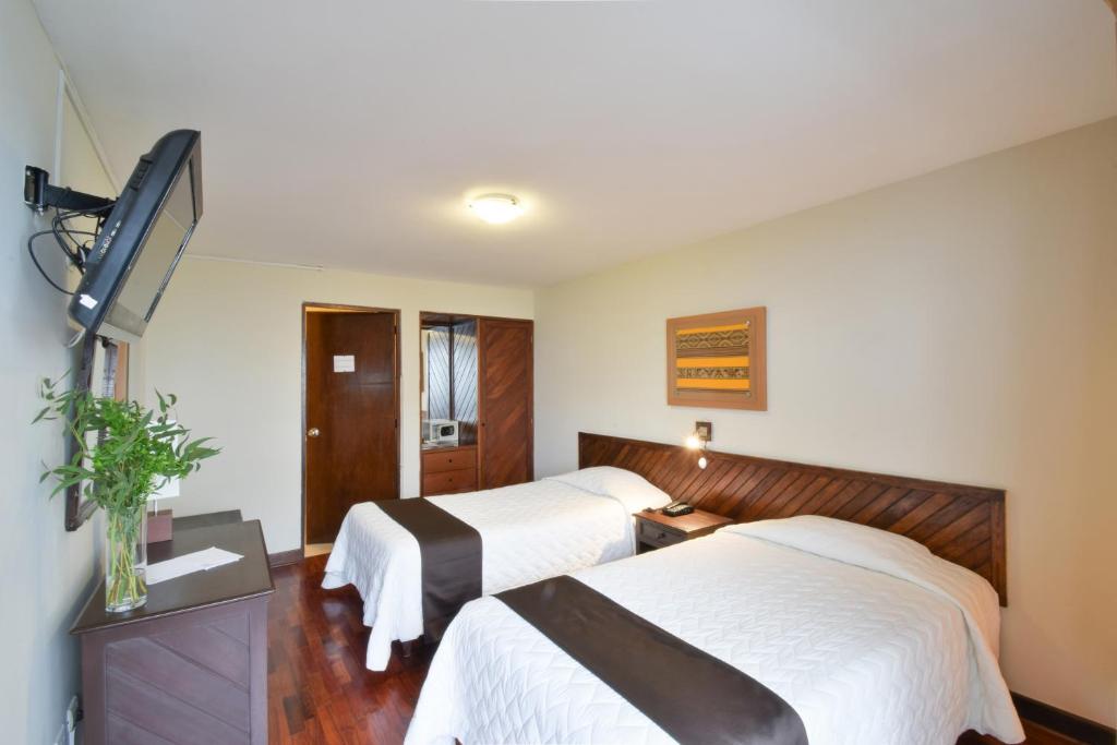 TV a/nebo společenská místnost v ubytování Hotel Señorial