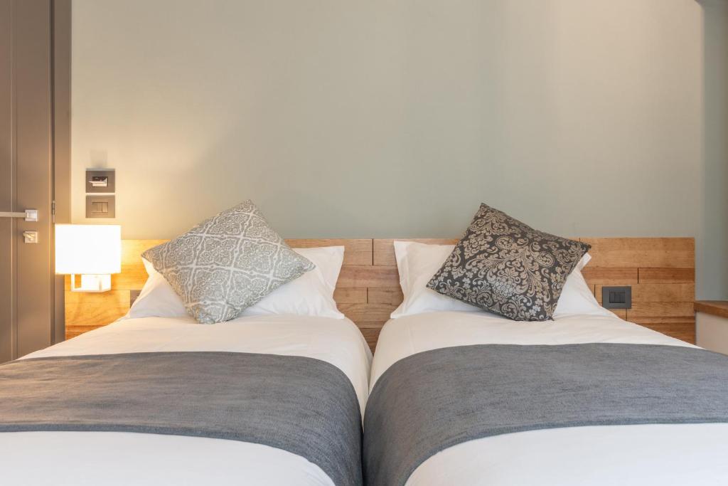 A bed or beds in a room at Borgopetra