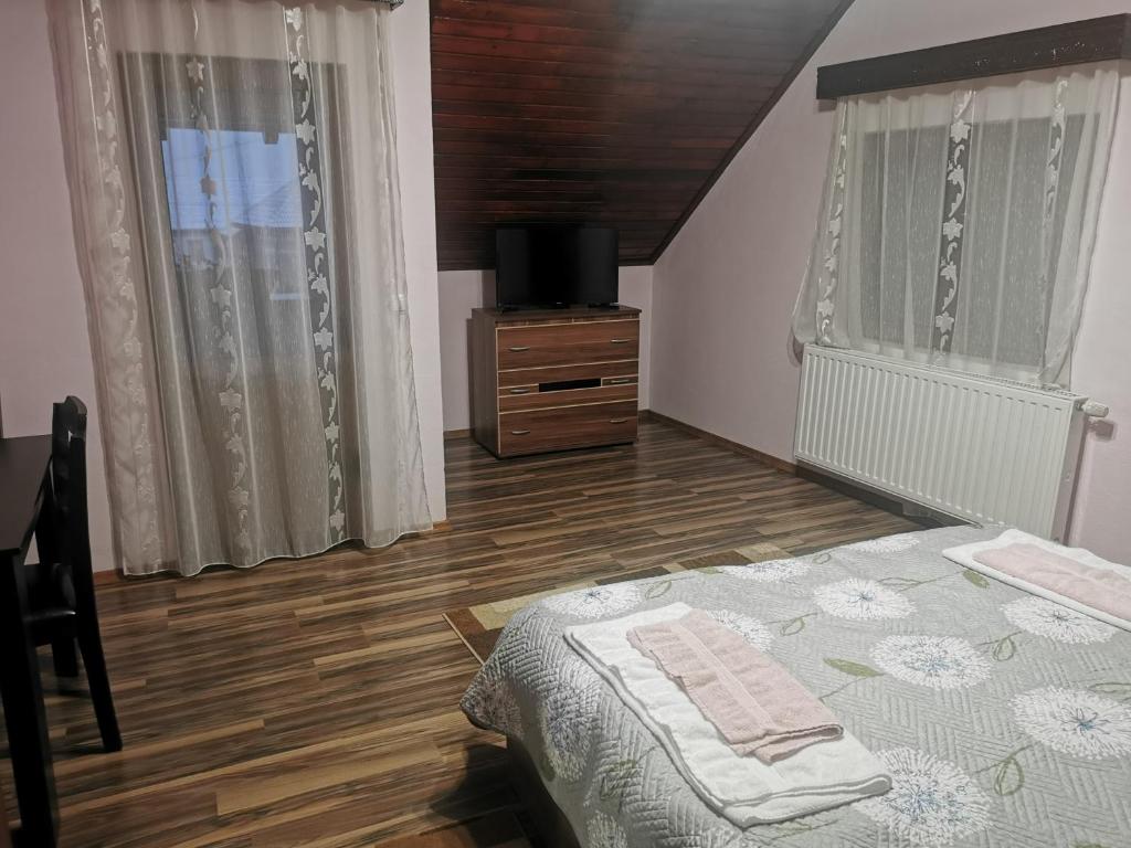 Postel nebo postele na pokoji v ubytování Casa Suzy & Roxy