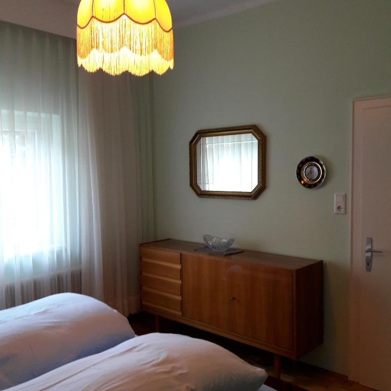 Postel nebo postele na pokoji v ubytování Villa Siebenruh