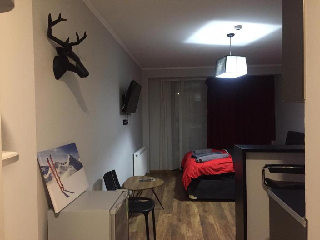TV a/nebo společenská místnost v ubytování SkiLuxe New Gudauri - Loft 2