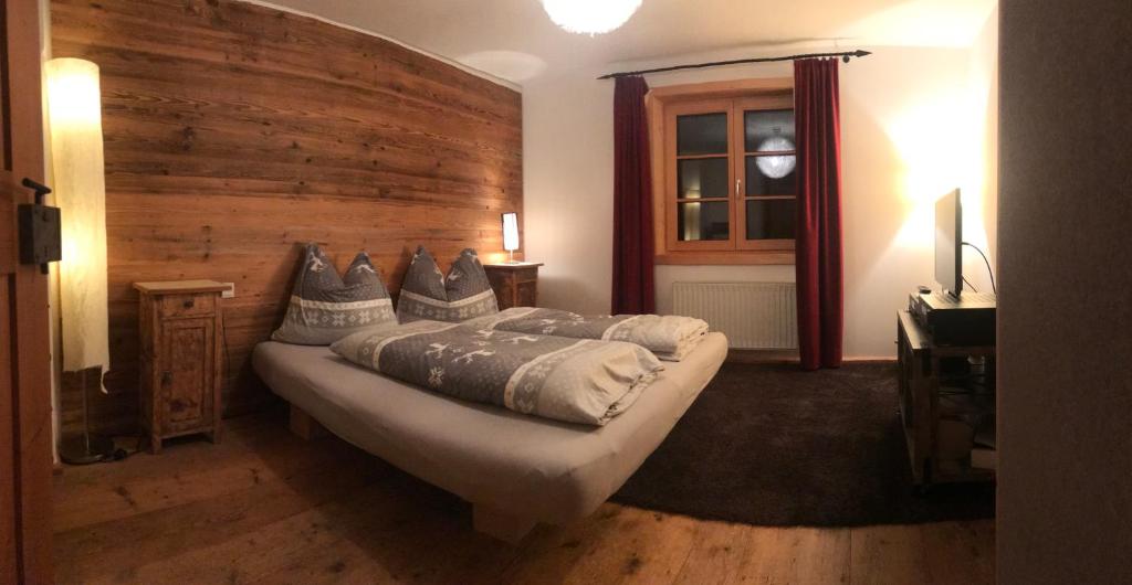 Postel nebo postele na pokoji v ubytování Tiroler Knusperhäuschen