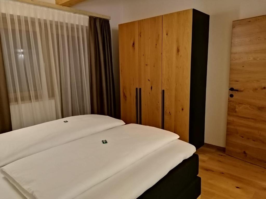 Letto o letti in una camera di Studler Hofchalets