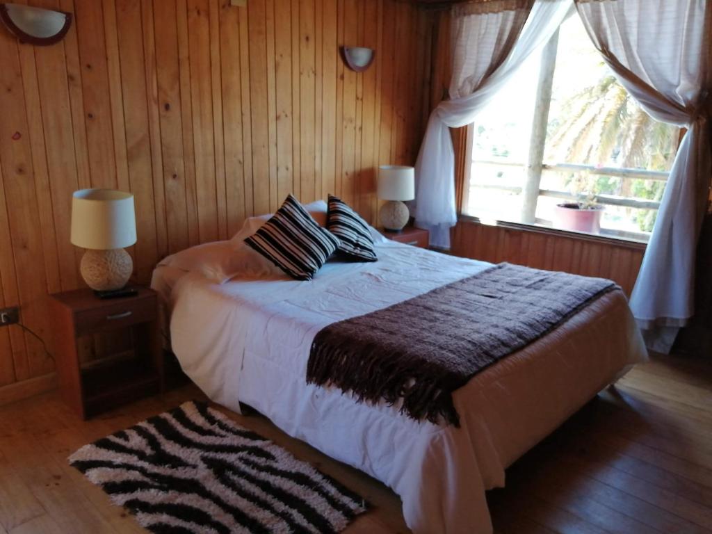 Postel nebo postele na pokoji v ubytování Hotel Green Papudo