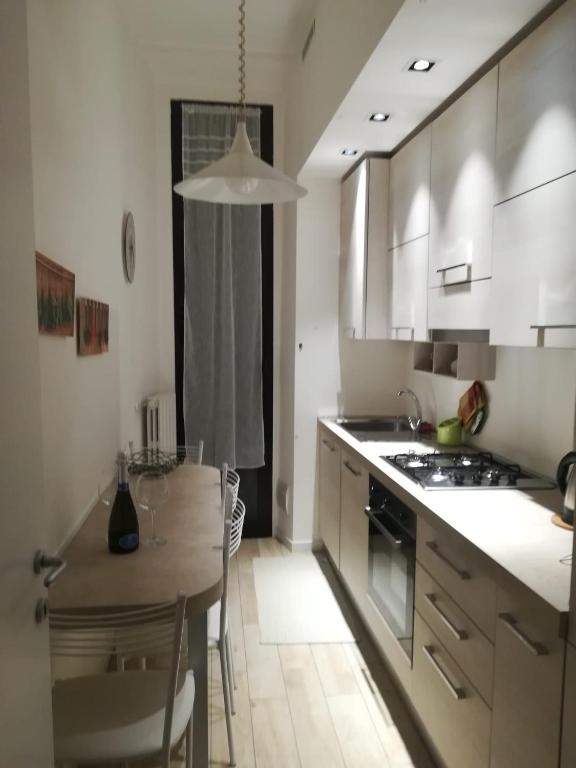 Kuchyňa alebo kuchynka v ubytovaní La Casa Dei Viaggiatori