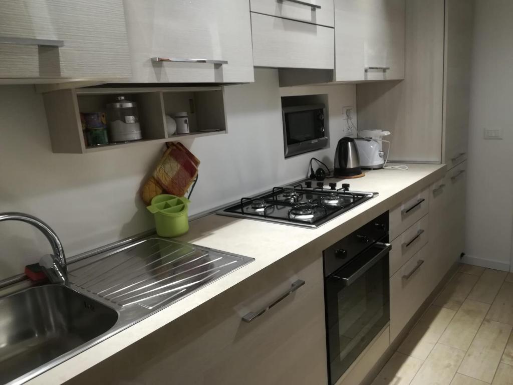 Kuchyňa alebo kuchynka v ubytovaní La Casa Dei Viaggiatori
