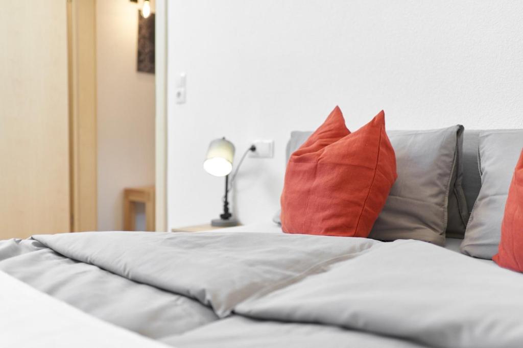 Postel nebo postele na pokoji v ubytování Appartement Alpen Flair
