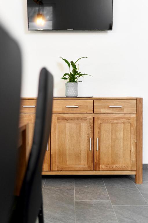 TV a/nebo společenská místnost v ubytování Appartement Alpen Flair
