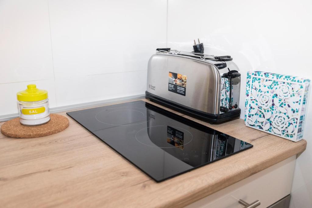 A kitchen or kitchenette at Apartamento Melina Arlu - Barrio La Victoria
