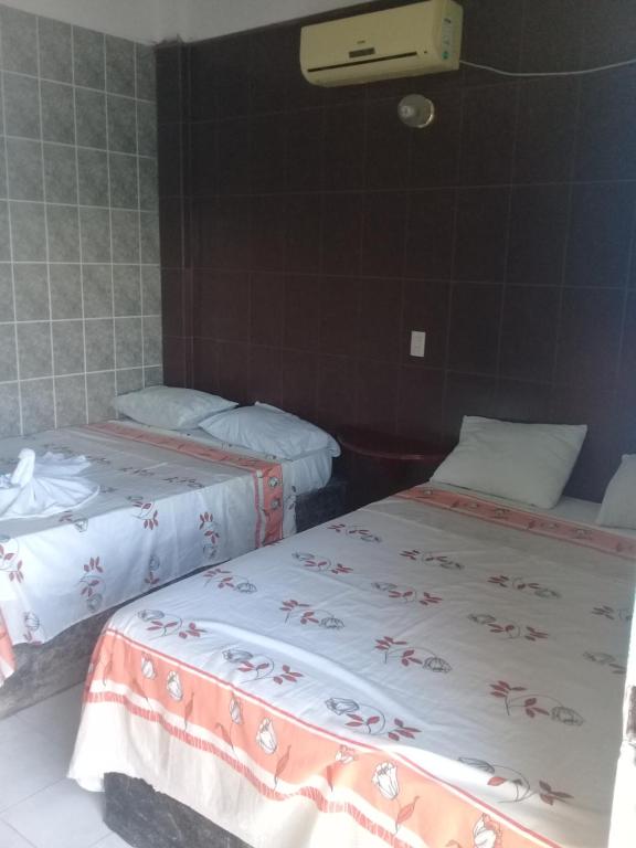 Postel nebo postele na pokoji v ubytování Hotel Naj Kin