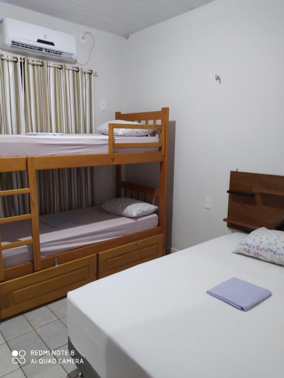 Postel nebo postele na pokoji v ubytování Hostel Lençóis Park