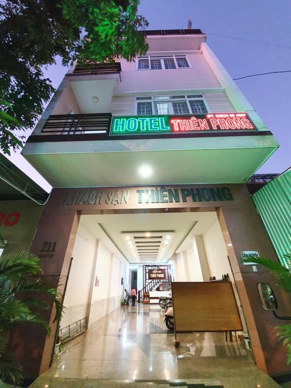 a building with a sign in front of it at Khách Sạn Thiên Phong in Buon Ma Thuot