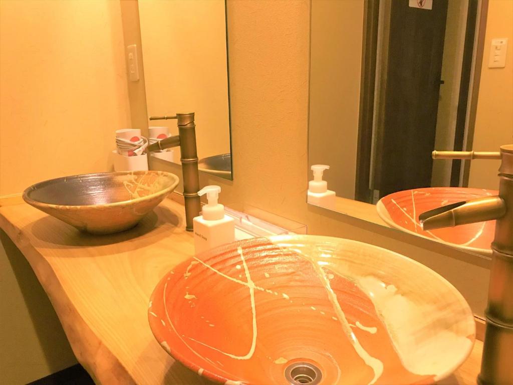 敷地内に源泉を持つホステル ケイズハウス箱根 – 箱根湯本温泉にあるバスルーム