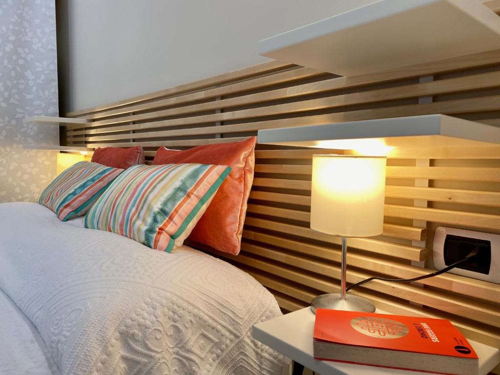 A bed or beds in a room at Al castello