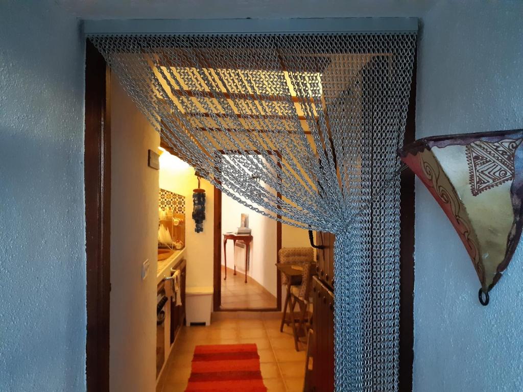 Postel nebo postele na pokoji v ubytování Cuevas Galera - Cuevas de la Luz