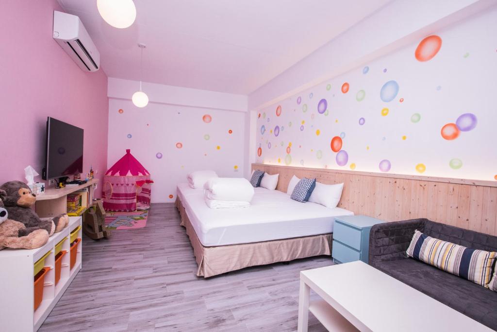 Postel nebo postele na pokoji v ubytování Seven beauties Homestay